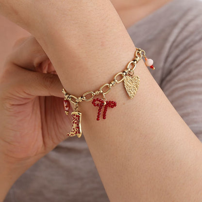 EDELSTAHL ARMKETTE RED CHARMS